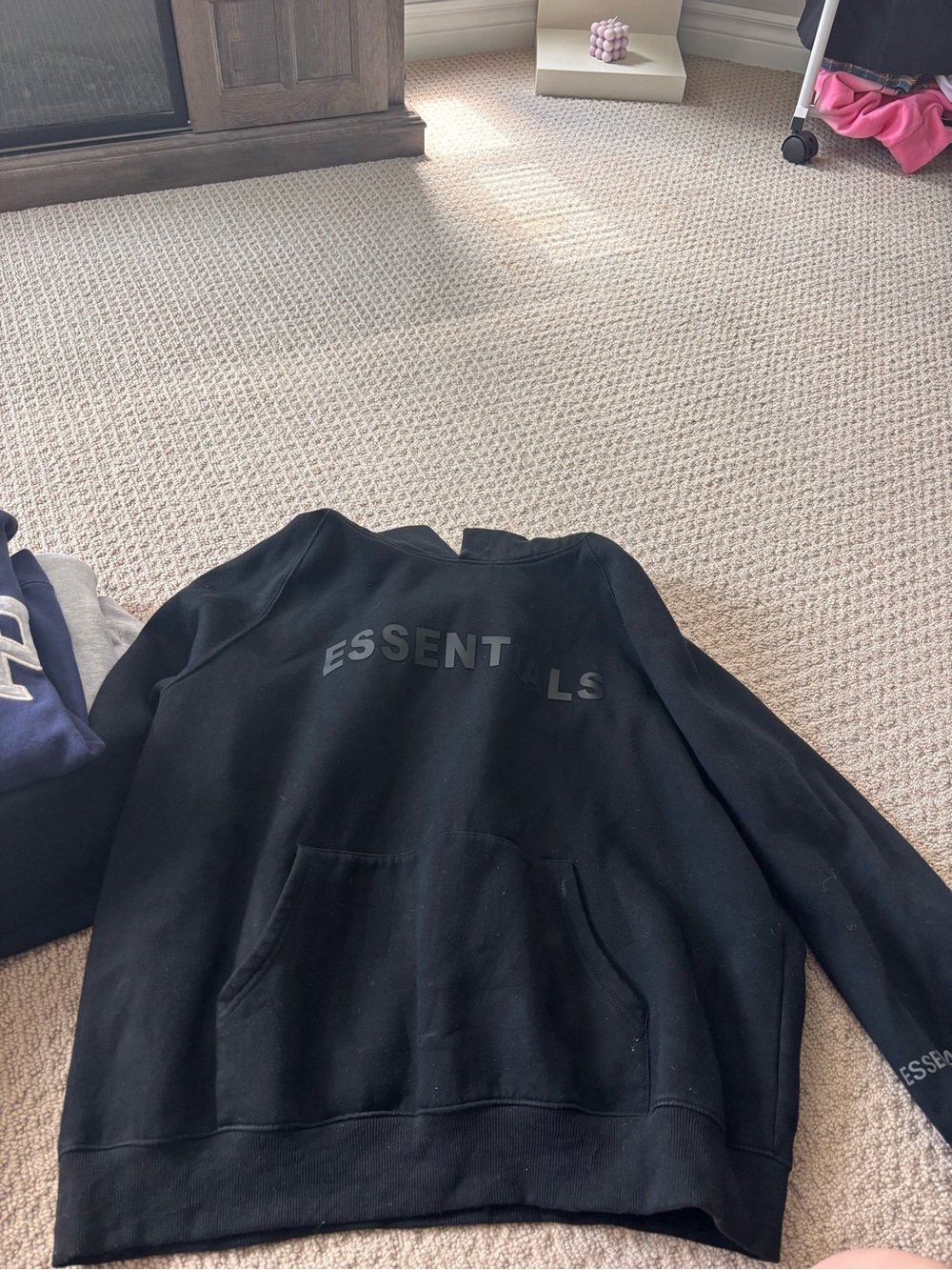 Essentials Black Pullover Hoodie with Subtle Logo